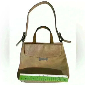 A Vince Camuto vivia Sahara sand colored leather crossbody bag